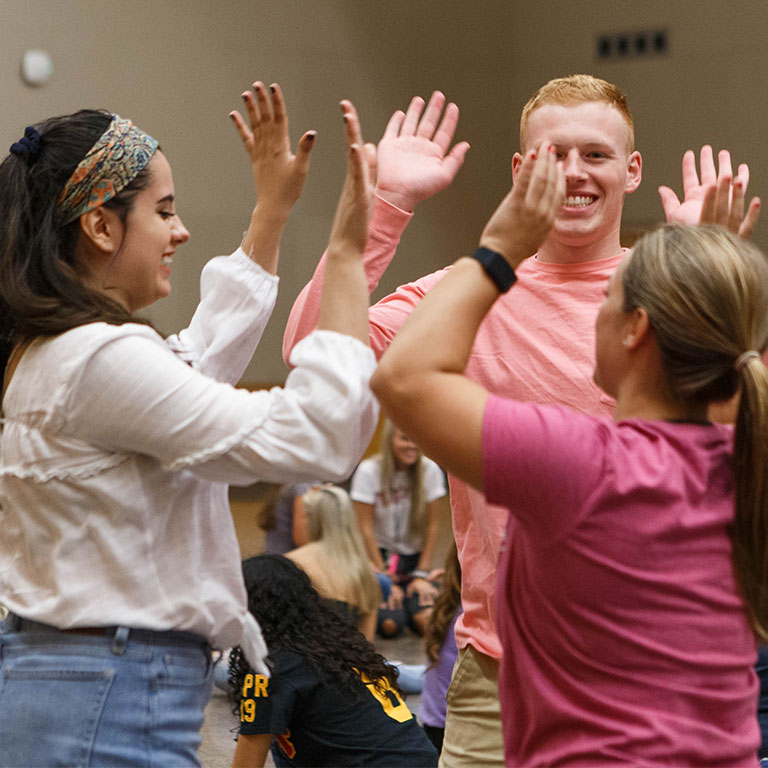Students participating in an event at playfair.